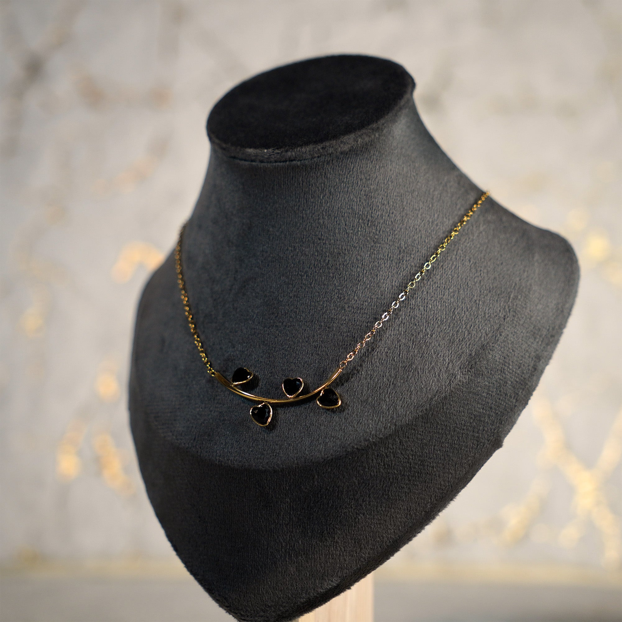 Four Heart Pendant Black Necklace